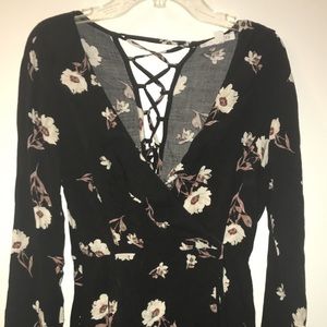 Socialite black floral ruffle wrap dress.